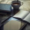 Cup Filled With Coffee Near Book