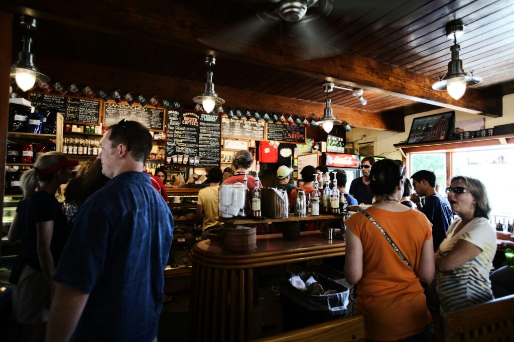 people in front of cafe desk