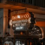 Photo of Neon Signage Hanging Near Building