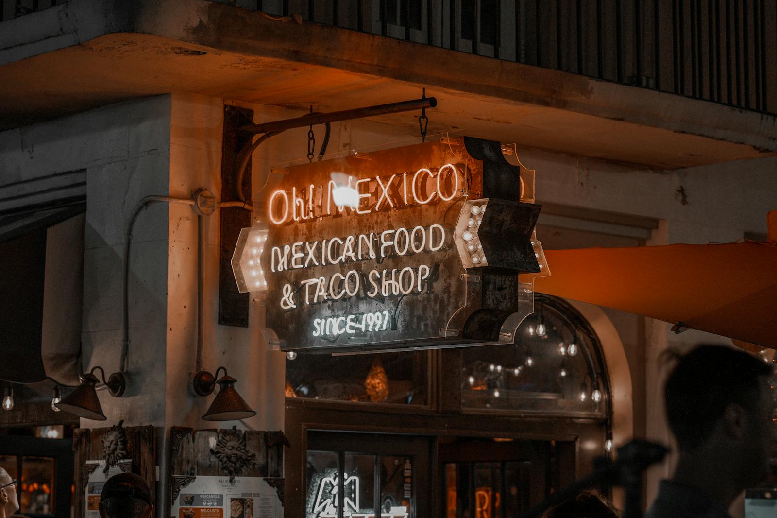 Photo of Neon Signage Hanging Near Building